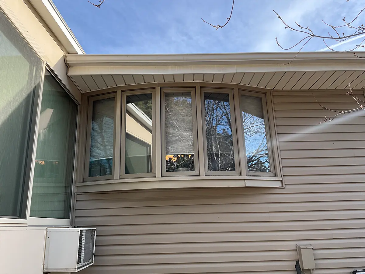 Before photo of an old house prior to window installation in Nebraska and Iowa.