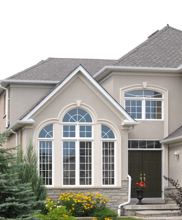 A wide view of a modern house exterior featuring premium work by local window replacement contractors in La Vista, NE.
